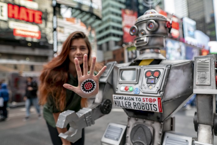 Marta Kosmyna, Silicon Valley Lead for the Campaign to Stop Killer Robots with robot campaigner David Wreckham. Photo: Ari Beser.